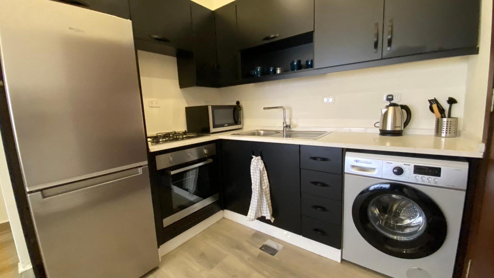 Dair Ghbar Apartment Амман Номер фото